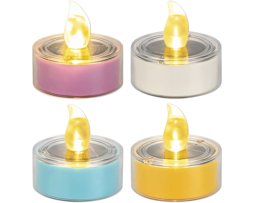 Vier solarbetriebene LED-Teelichter in verschiedenen Farben