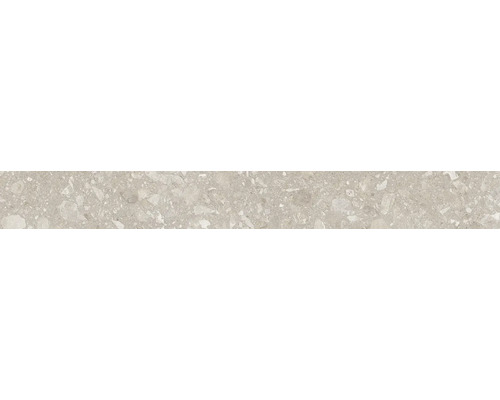 Feinsteinzeug mit Terrazzo-Optik und verschiedenen Einschlüssen.