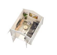 Innenansicht eines Gartenhauses mit Wohnbereich, inklusive Sofa, Tisch und Fernseher