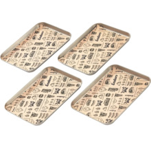 Vier Grillschalen mit Grillpapier