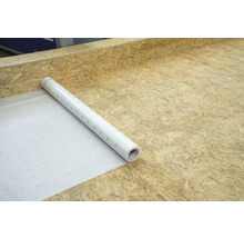 Rolle weiße Unterlagsbahn auf Holzuntergrund