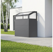 Mülltonnenbox aus Metall und Glas vor einem Gebäude