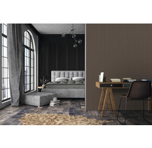 Schlafzimmer mit Bett, Schreibtisch und Paneelwand