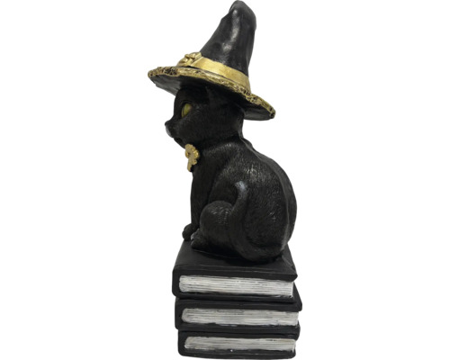 Dekorative schwarze Katzenfigur mit Hexenhut auf Bücherstapel