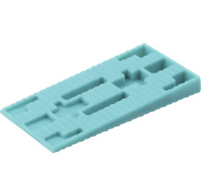 Rechteckiger Verglasungsklotz aus Kunststoff mit Einkerbungen zur präzisen Fenstermontage und zum Ausgleichen von Unebenheiten.