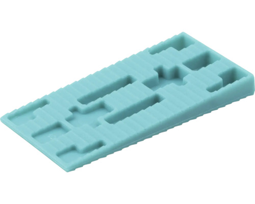 Rechteckiger Verglasungsklotz aus Kunststoff mit Einkerbungen zur präzisen Fenstermontage und zum Ausgleichen von Unebenheiten.