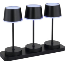 Drei schwarze Tischleuchten auf einer schwarzen Basis