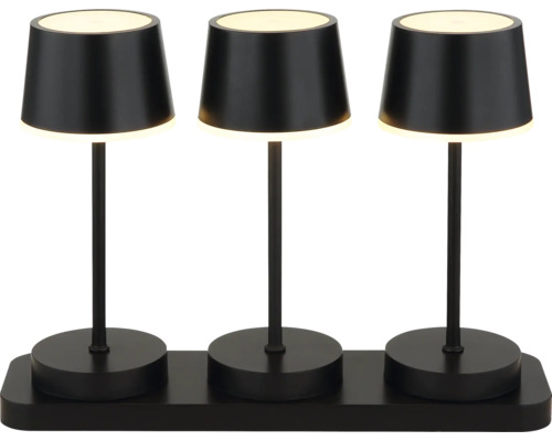 Drei schwarze Tischleuchten auf einer Basis