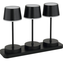 Drei schwarze Tischleuchten auf einer Halterung