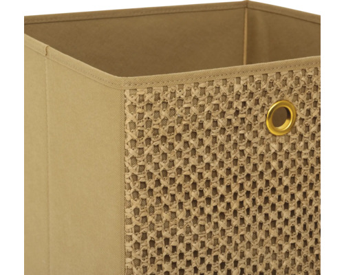 Detailansicht einer Stoffbox mit gewebtem Einsatz und Metallöse