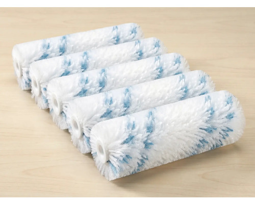 Fünf weiße Farbwalzen mit Musterung