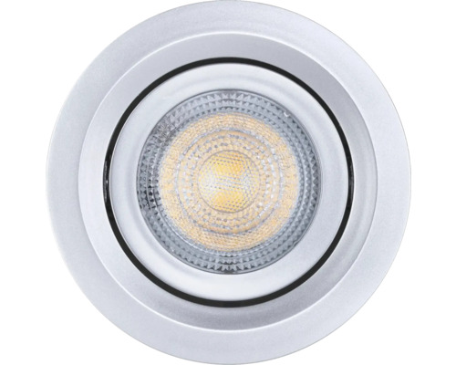 Runder Einbaustrahler aus Metall mit strukturiertem LED-Leuchtmittel.