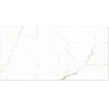 Weiße Fliese in Marmoroptik mit grauer Maserung.