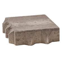 Pflasterstein aus Beton mit verzahnten Kanten für Gartenwege und Einfahrten.