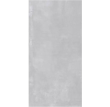 Rechteckige Wandfliese in grauer Betonoptik.