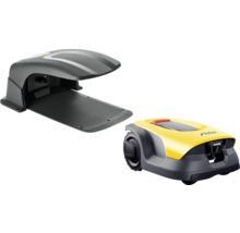 Gelb-grauer Stiga Mähroboter mit Ladestation und Garage.