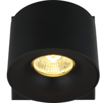 Schwarze zylindrische Außenwandleuchte mit warmem Licht.