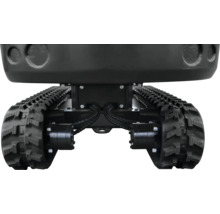 Kettenfahrwerk eines Minibaggers mit schwarzen Gummiketten und hydraulischem Antrieb.