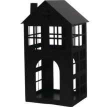 Schwarzes Windlicht in Hausform aus Metall mit Fensteröffnungen und Schornstein.