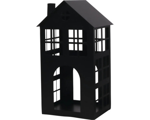 Schwarzes Windlicht in Hausform aus Metall mit Fensteröffnungen und Schornstein.