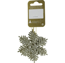 Schneeflocke als Weihnachtsbaumschmuck mit Glitzer, Aufhängeschlaufe und Produktetikett.