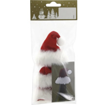 Kleine Weihnachtsmütze aus rotem und weißem Plüsch als Flaschendekoration in der Verpackung.
