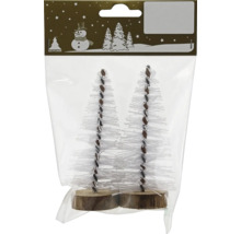 Zwei kleine künstliche Weihnachtsbäume mit weißen Borsten auf runden Holzsockeln in einer Verpackung.