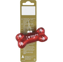 Roter Weihnachtsbaumschmuck aus Glas in Knochenform mit der Aufschrift I love my dog und weißen Pfotenabdrücken.