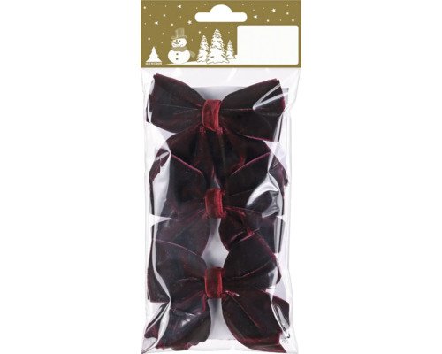 Drei dunkelrote Samtschleifen für die Weihnachtsdekoration.