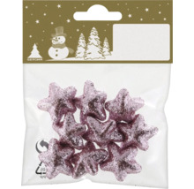 Kleine rosa Glitzersterne in einer transparenten Kunststoffverpackung.