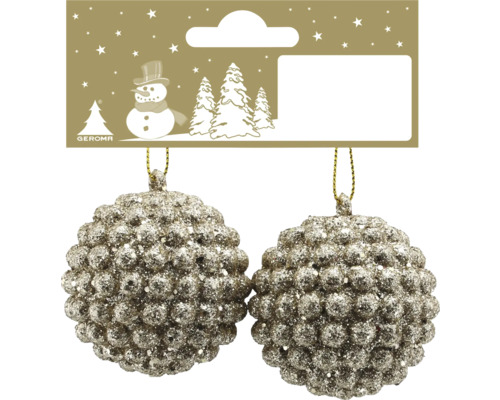 Zwei glitzernde Weihnachtskugeln mit strukturierter Oberfläche und Geroma Logo auf der Verpackung.