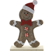 Weihnachtsdekoration Lebkuchenmann aus Filz mit Nikolausmütze, Fliege und Knöpfen in Zuckerstangen-Optik auf einem Holzsockel.