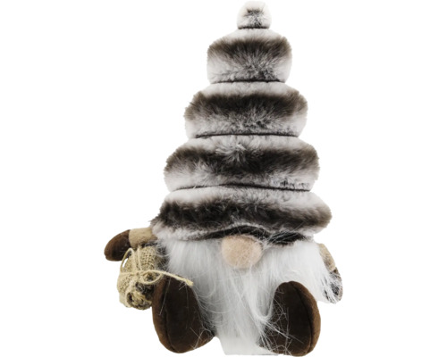 Weihnachtswichtel mit gestreifter Kunstfellmütze, weißem Bart, braunen Füßen und kleinem Jutesack.