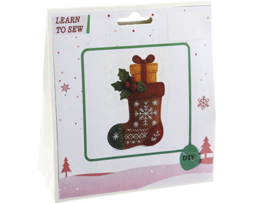 Nähset zum Selbermachen für einen Weihnachtsstrumpf aus Filz mit Schneeflocken und Geschenkkarton-Motiv.