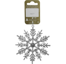 Silberne glitzernde Schneeflocke als Weihnachtsanhänger mit Aufhänger und Produktetikett inklusive Geroma Logo.