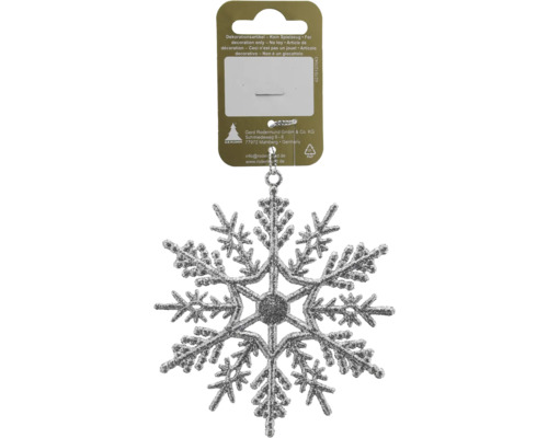 Silberne glitzernde Schneeflocke als Weihnachtsanhänger mit Aufhänger und Produktetikett inklusive Geroma Logo.