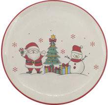 Runder Weihnachtsteller aus Keramik mit Motiven von Weihnachtsmann, geschmücktem Weihnachtsbaum mit Geschenken und Schneemann.