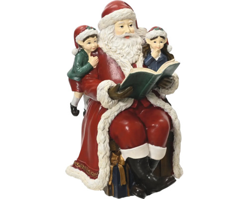 Weihnachtsfigur Weihnachtsmann sitzend und zwei Kindern aus einem Buch vorlesend.