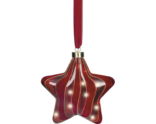 Sternförmiger Christbaumschmuck aus Glas mit roten und goldfarbenen Wellenstreifen, an einem roten Samtband hängend.