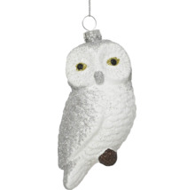 Christbaumschmuck in Form einer Eule, weiß mit silbernem Glitzer und Aufhängung.