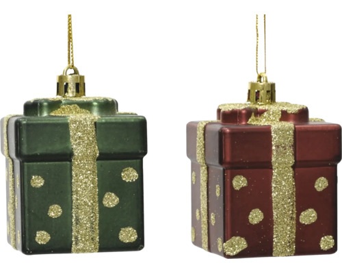 Zwei Christbaumschmuck-Anhänger in Form von Geschenkpaketen mit glitzernden Bändern und Punkten sowie goldenen Aufhängern.