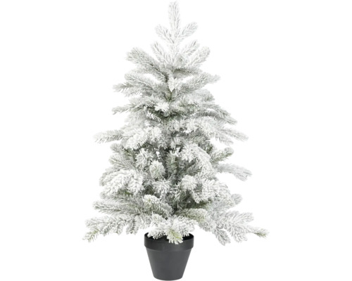 Künstlicher Weihnachtsbaum mit Kunstschnee im schwarzen Topf.