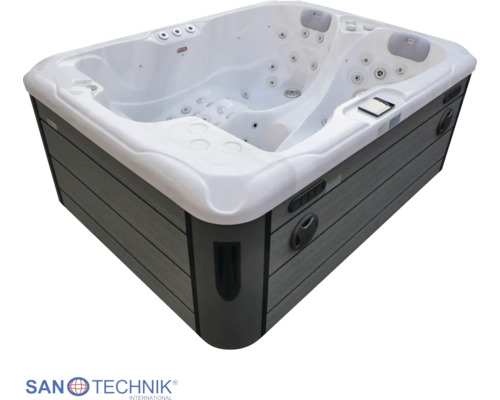Außenwhirlpool mit weißer Acrylwanne, grauer Verkleidung in Holzoptik, Massagedüsen und Kopfstützen.
