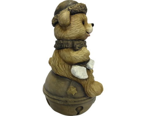 Dekofigur brauner Bär mit Wintermütze und Schal sitzend auf einer Glocke mit Sternmotiv.