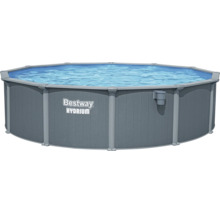 Bestway Hydrium Stahlwandpool, runder Aufstellpool mit Außenwand in Paneel-Optik und integriertem Skimmer, mit Wasser gefüllt.