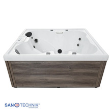 Whirlpool mit Verkleidung in Holzoptik, Massagedüsen und Kopfstütze. Sanotechnik Logo.