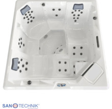 Sanotechnik Whirlpool Draufsicht mit zahlreichen Massagedüsen, Kopfstützen und integriertem Bedienfeld.