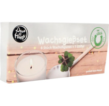 Wachsgießset von Deco @ Home mit sechs Wachsfiguren und einem Löffel in der Verpackung.