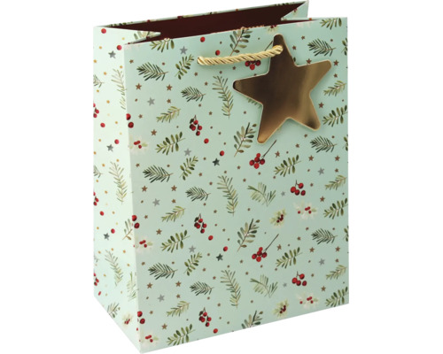 Weihnachtliche Geschenktüte mit Tannenzweigen, roten Beeren und einem goldenen Stern-Anhänger.
