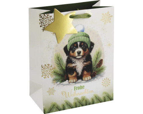 Weihnachtsgeschenktüte mit Berner Sennenhund-Welpe mit Mütze, Tannenzweigen, Aufschrift Frohe Weihnachten und Stern-Anhänger.